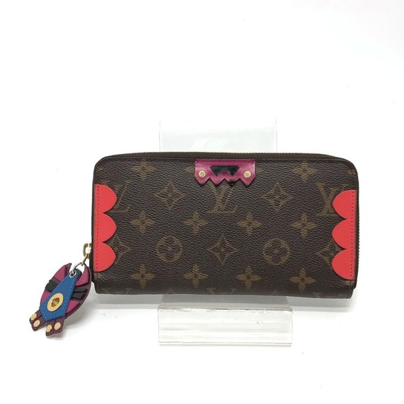LOUIS VUITTON Brown Monogram Wallet - Picture 1 of 16